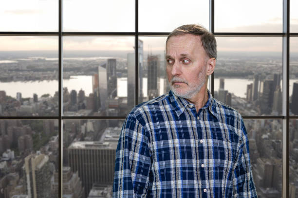 istock Portrait of confused aged man is looking back. 2167587633