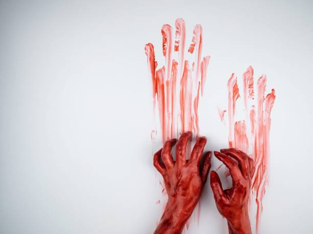 istock Female hands in blood on a white background. 2167594659