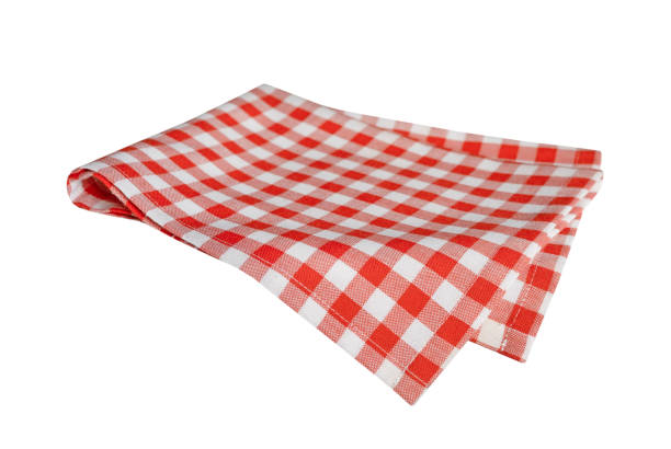 istock Folded gingham checkered cloth isolated on white.Food decor, picnic towel. 2167595973