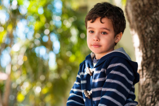 istock Cute boy outdoors 2167596234