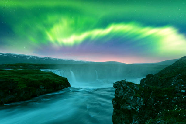 istock Aurora borealis Northern lights over Kirkjufellsfoss waterfall 2167596897