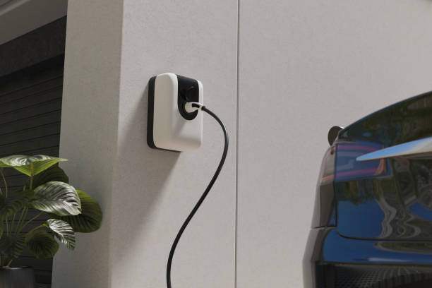 istock Ev car charging with ev charger at home 2167602228