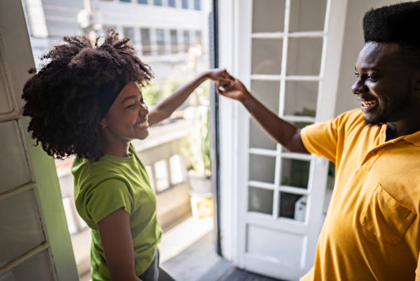 istock Couple dancing in a hotel room 2167604940