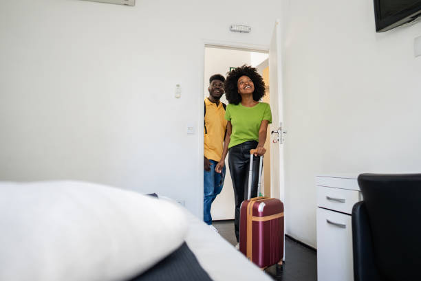 istock Couple entering in a hotel room 2167605012