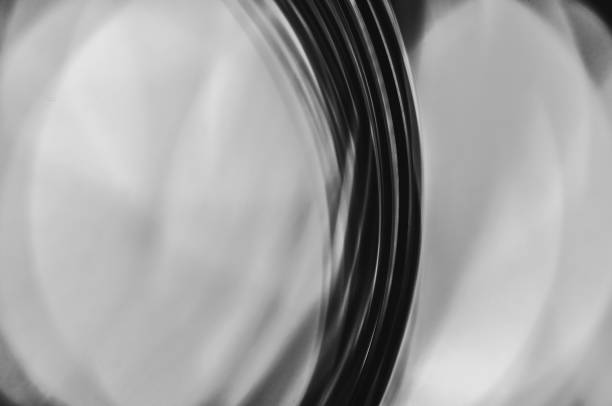 istock Close-up macro of a thin wire backlit in black and white abstraction macrophotography 2167605158