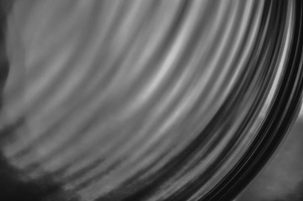 Close-up macro of a thin wire backlit in black and white abstraction macrophotography
