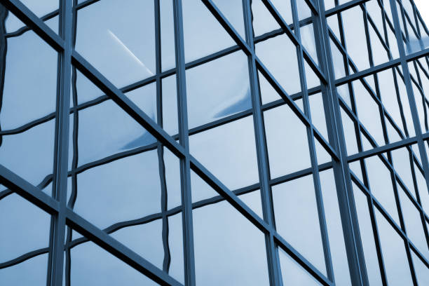 istock Sleek Modern Office Tower with Reflective Glass Facade 2167605428