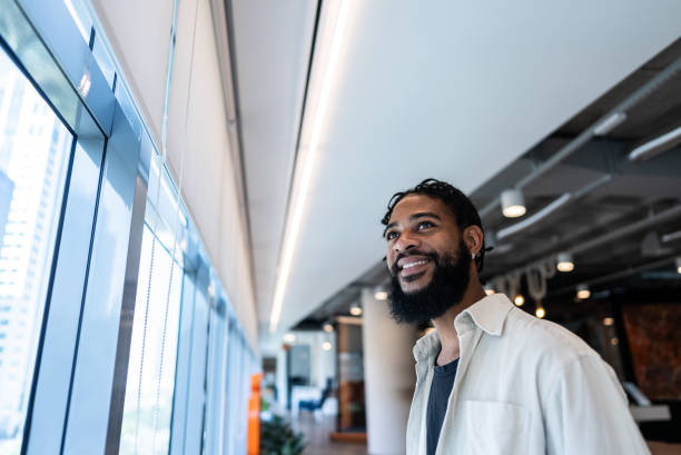 istock Young man contemplating at coworking 2167605463