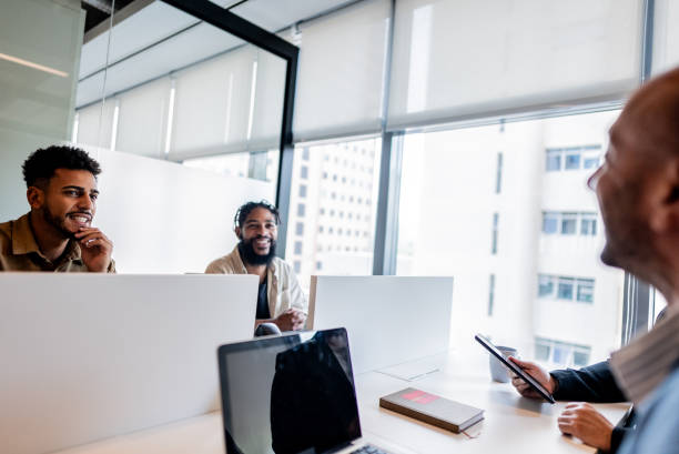 istock Coworkers talking and working at office 2167605471