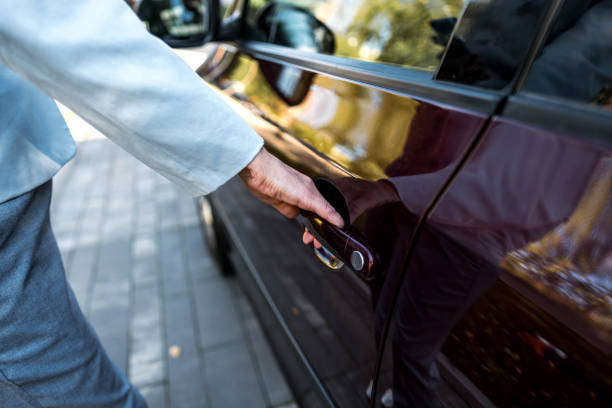 istock Woman gets into the car 2167607936