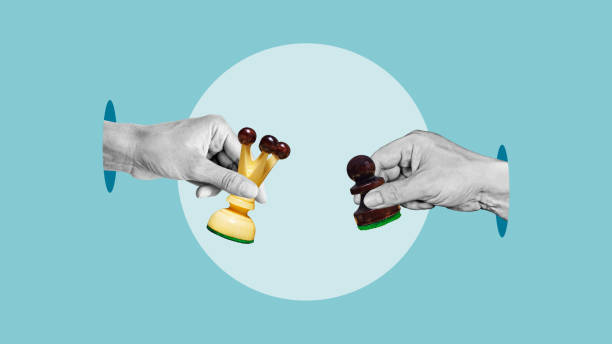 istock Hands holding chess figures opponents intellectual game strategy politics playing on drawn background. Competitive strategy and conflict of interest 2167608629