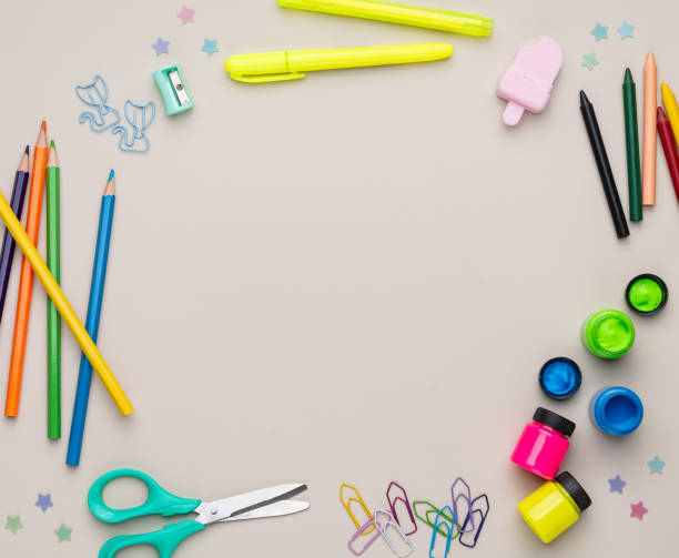 istock Back to school backdrop. School supply over light brown background with copy space 2167610386