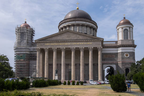 Esztergom Basilica, the largest church in Hungary. In the foreground Danube River under a bright summer sky. Esztergom in Hungary - Europe