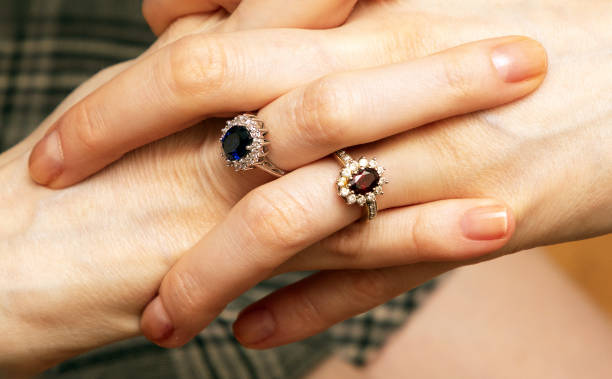 istock Diamond rings on female hands 2167616896