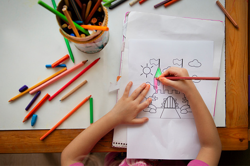 Coloring Activity Example A Child Is Doing A Coloring Activity Coloring Activity 1 Stock Photo ...