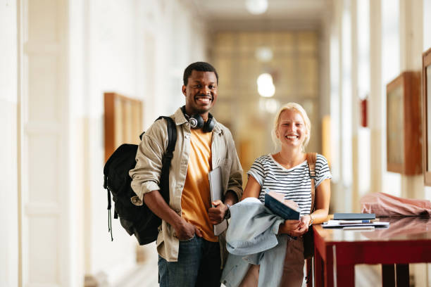istock University Students Smiling in a Bright Academic Hallway 2167617547
