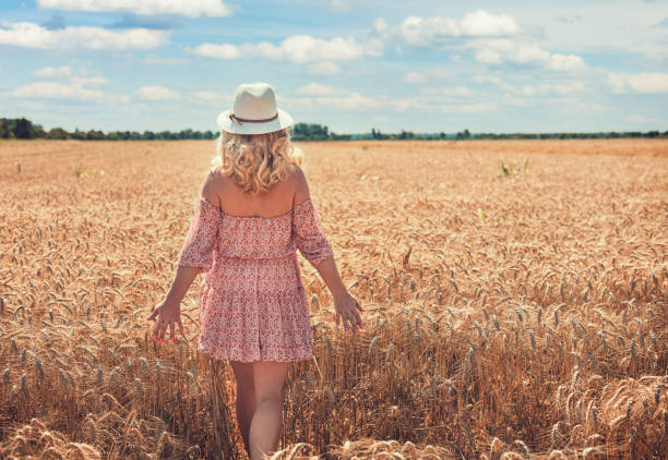 Young woman in summer field
