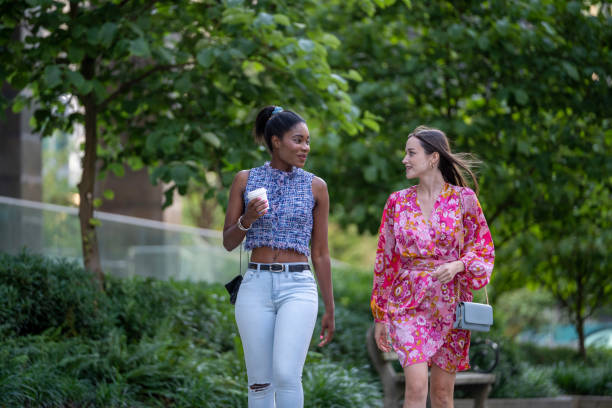 istock Young women walk on paved pathway, Vancouver 2167620696