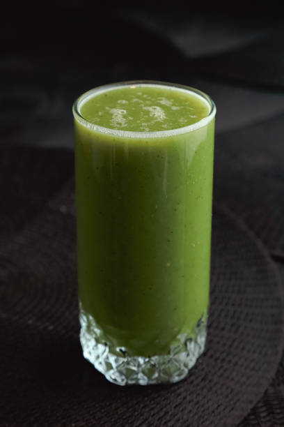istock Glass of green juice 2167637692