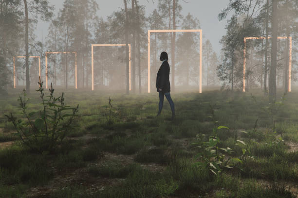 istock Woman standing in mysterious forest 2167646758