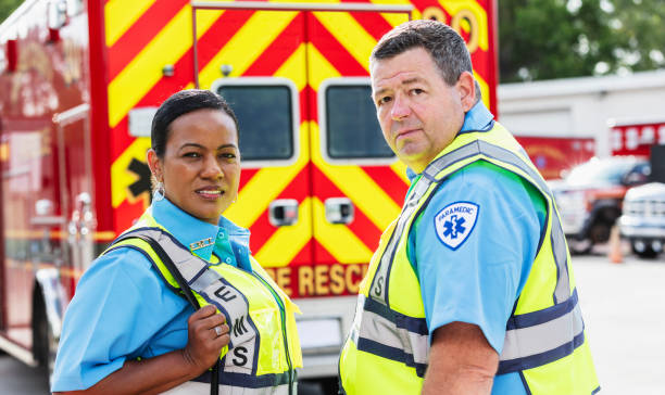 istock Paramedic and EMT team walking toward rescue ambulance 2167656721