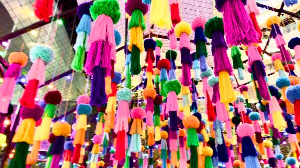 istock Colorful yarn tassels hanging from the ceiling. 2167675130