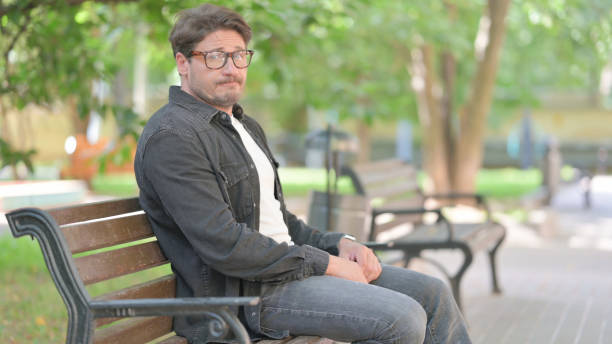 istock Middle Aged Man in Denial Looking at Camera Outdoor 2167680358