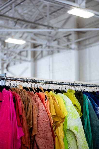 istock Colorful Vibrant Clothing Rack at a Thrift Store 2167683375
