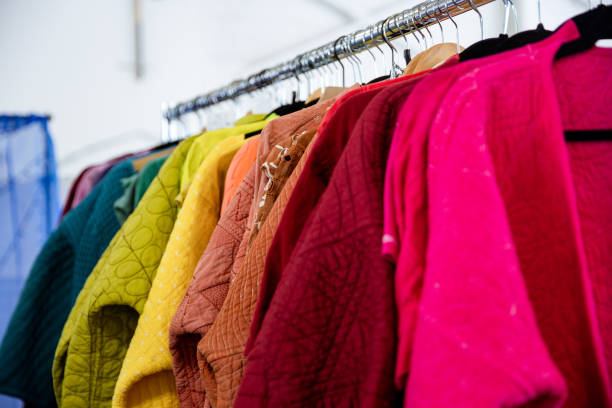 istock Colorful Vibrant Clothing Rack at a Thrift Store 2167683376