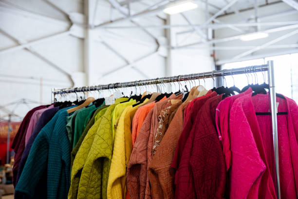 istock Colorful Vibrant Clothing Rack at a Thrift Store 2167683377