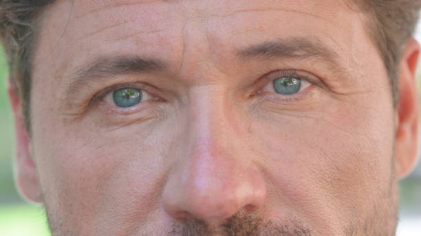 istock Blinking Eyes of Middle Aged Man, Close up 2167684767