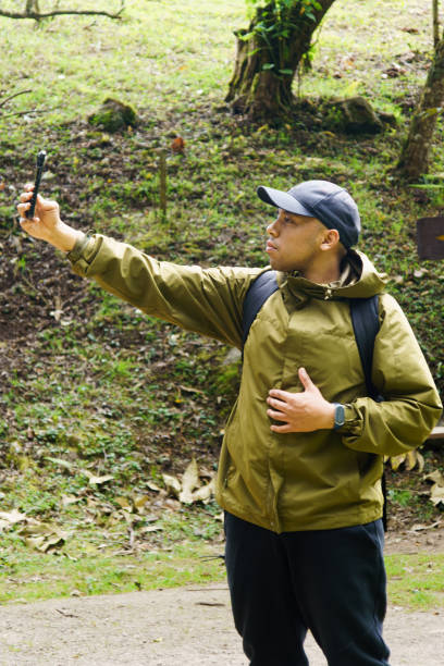 istock A man wearing a green jacket 2167695075