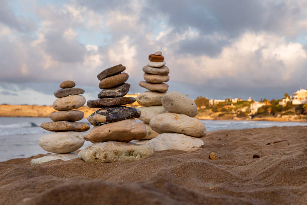 Stack balanced rocks on the beach. Cyprus Mediterranean sea coastline