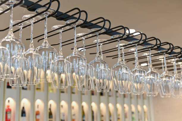 istock Clean wine glasses hang on a holder. 2167698246