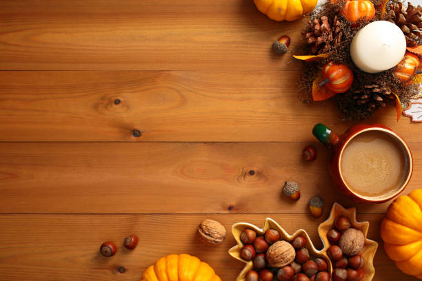 istock Cozy autumn still life. Fall decor on wooden desk table top view. 2167704637