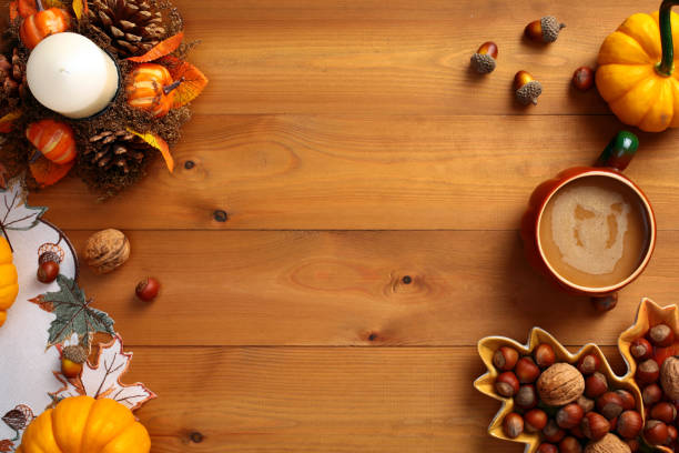 istock Pumpkins and autumn decor on dark wood background. Flat lay, top view, copy space. 2167704687