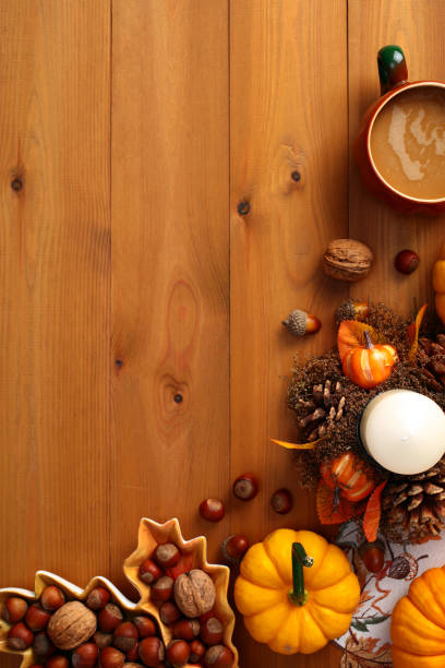 istock Vertical autumn flat lay composition with fall decor on wooden desk table. 2167704820