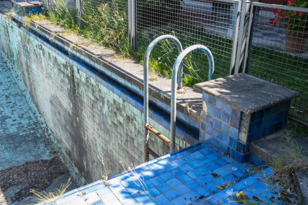 istock Abandoned old swimming pool without water 2167705195