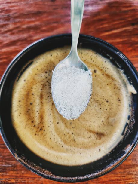 istock Latte coffee with milk and sugar on wood backgruond 2167706029