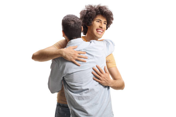 istock Happy young men in embrace 2167707006