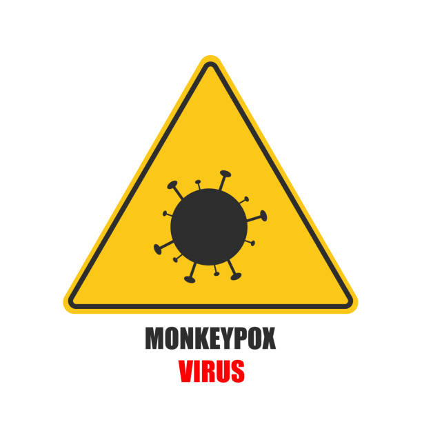 istock Yellow sign warning of monkeypox virus. Sign showing the virus. 2167707689