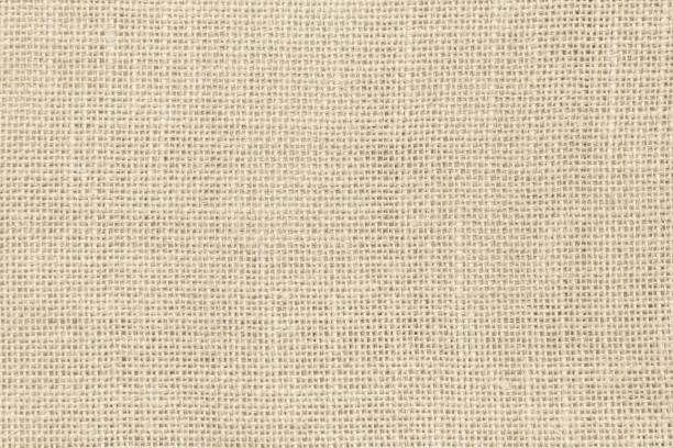 istock Brown sackcloth woven texture background in natural pattern. Jute hessian burlap, linen background in light beige cream color blank. Weaving canvas fiber line cotton cloth textured as organic. 2167708856