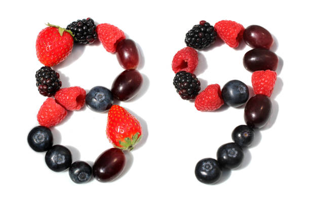 istock berry anniversary number 89 from berries: raspberry, blackberry, strawberry with green leaf, blueberries, grape 2167709523