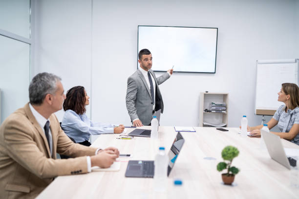 istock Man presenting during a business meeting in office. 2167709707
