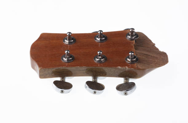 istock broken guitar headstock isolated on white background 2167718334