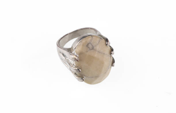 istock ancient silver ring with white stone isolated on white background 2167719860
