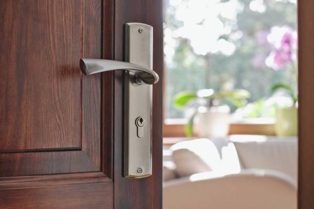 istock Half opened door into the modern cozy home interior 2167720593