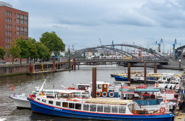 Germany, Hamburg, Harbor, August 17, 2024 - Hamburg harbor with harbor barges