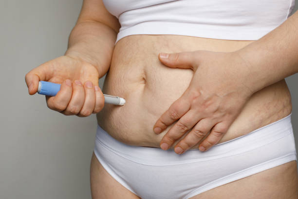istock Injection with insulin pen close up 2167723914