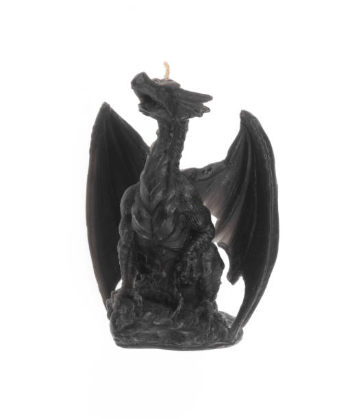 istock black dragon candle isolated on white background 2167723991